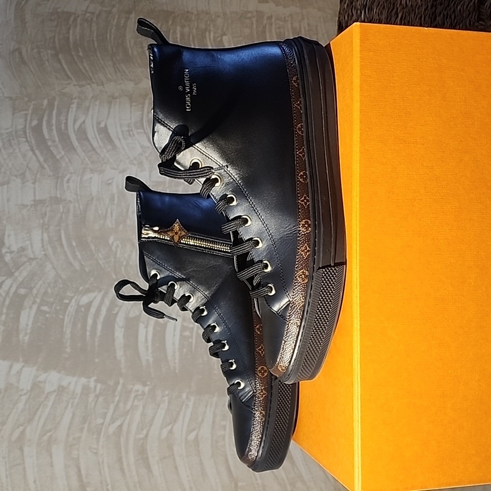 Louis Vuitton high top fashion tennis shoe. Authentic